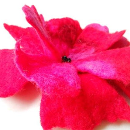 I design and manually felt unique clothing and accesories made from wool that I do no reproduce.