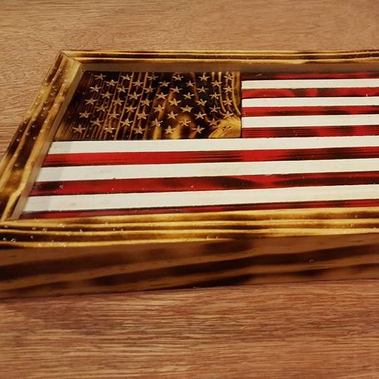 Sleepy Woodworking is a veteran owned and operated business that provides custom wooden flags and other items upon request.