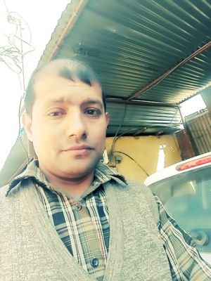 top_adhikari's profile picture. 