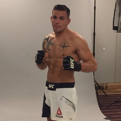 a professional mma fighter 21-5 Ufc fighter @cagewarriors middle weight world champion serving paratrooper
