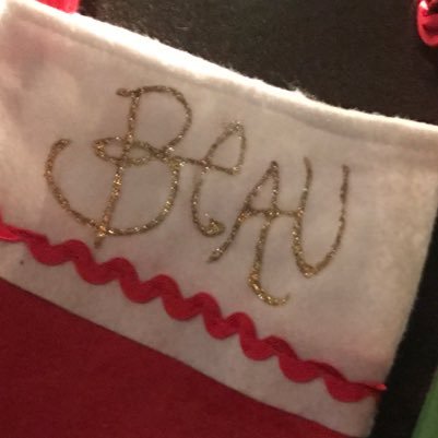 schris's profile picture. Black chalk living room couch professor