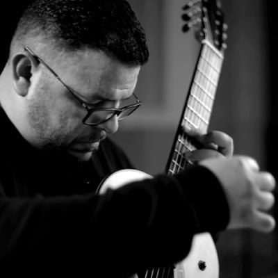 Award-winning guitarist, Isaac Bustos serves on the faculty at Texas A&M University and is artistic director of the Texas A&M Guitar Symposium.