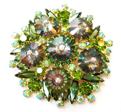 Always out looking for the finest vintage costume jewelry, accessories, collectibles and antiques. I visit markets + shows along the East Coast, always hunting!