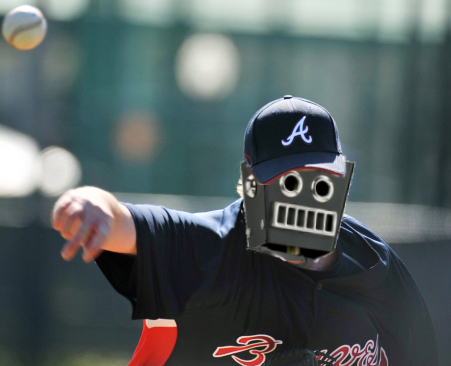 HIGH VELOCITY AUTOMATON PROGRAMMED TO THROW HUMAN BASE BALL
