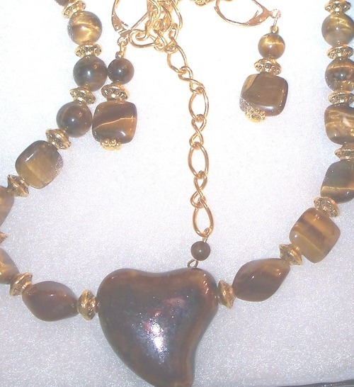 I make handcrafted jewelry, to which I am addicted, to help supplement my retirement income.