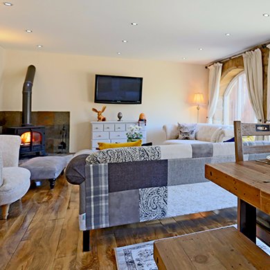 A beautiful luxury holiday cottage in Otterburn, Northumberland. The converted stone barn is within the Cheviot Hills in Redesdale close to Kielder Water.