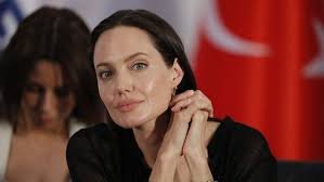This profile focuses on the humanitarian work and business endeavors of Angelina Jolie.