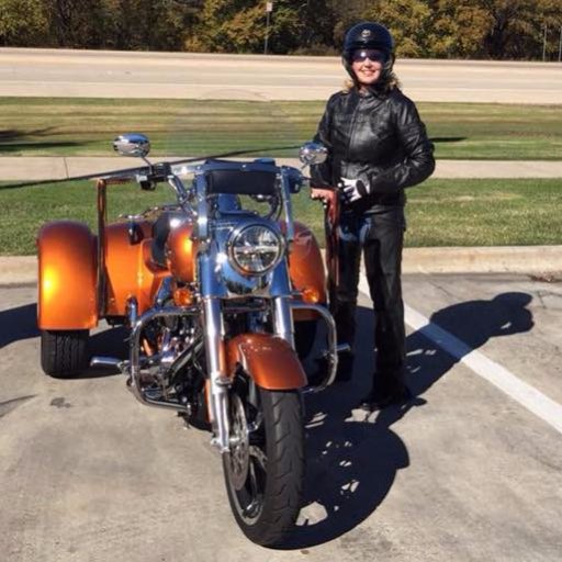 I love riding my Harley-Davidson Freewheeler: meeting people; seeing new places; smelling EVERYTHING; the wind in my face; absolute freedom!!!