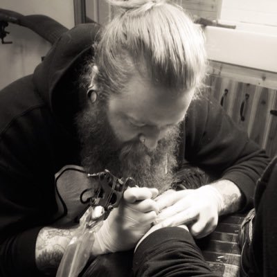 Professional Body Piercer, Tattoo Collector, Motorcycle Enthusiast, Powerlifting