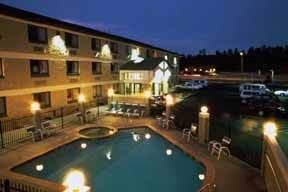 We are a hotel and motel located one mile south of the entrance to Grand Canyon National Park on the South Rim of the Canyon