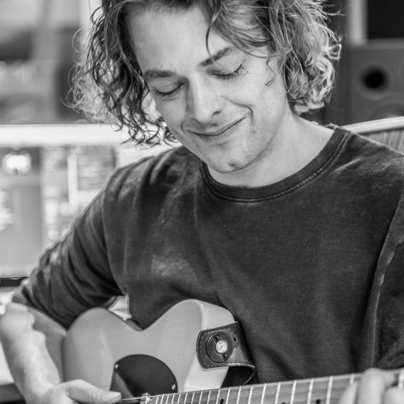 producer, composer, engineer, guitarist, mellotronist, father