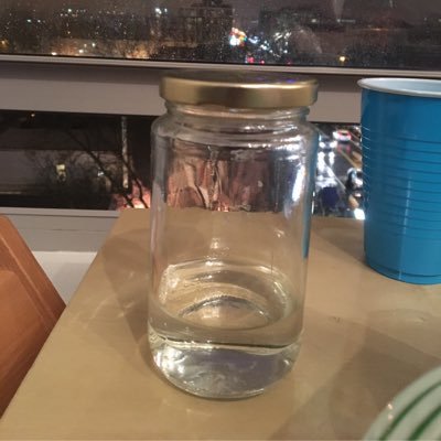 Former jelly container turned moonshine lover