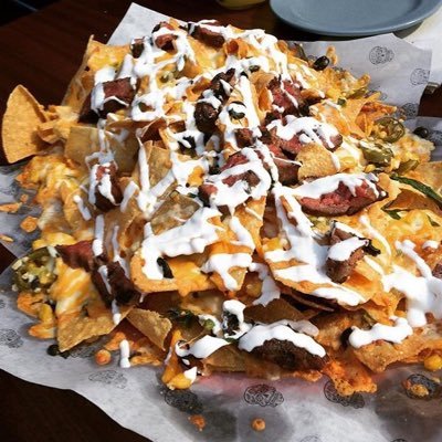 A couple of pub loving foodies dedicated to finding the best nachos in Calgary