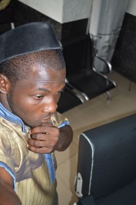 am an artiste, a photographer. very easy going gangster, and a complete businness man.
