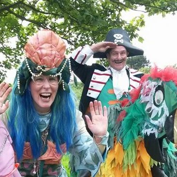 We are a street theatre company. Our portable performances brim with delightful comic characters, crazy contraptions  and gorgeous costumes.