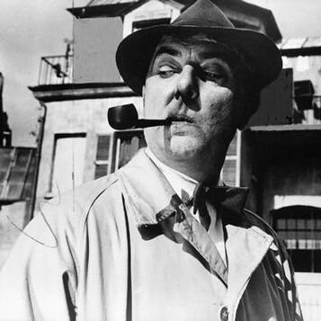 Monsieur Hulot wears a hat, chomps on a pipe and walks absent minded.