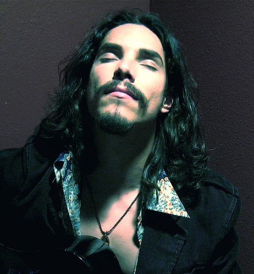 Composer, improviser, guitarist, multi-instrumentalist, singer, educator