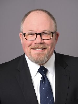 Local government expert, entrepreneur and conservative.