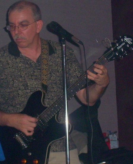 I play lead guitar in the band.
Our name is Double Cross