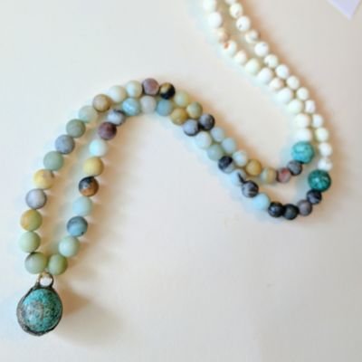 Handmade jewelry, made using only natural elements, semiprecious gemstones, mixed metals, and glass. Each piece is one of a kind.