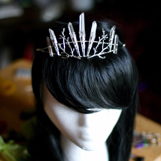 I make crystal tiaras, hair pins, and decorative combs for Renaissance fairs, music festivals, costumes, and bridal parties. Check me out on Etsy!
