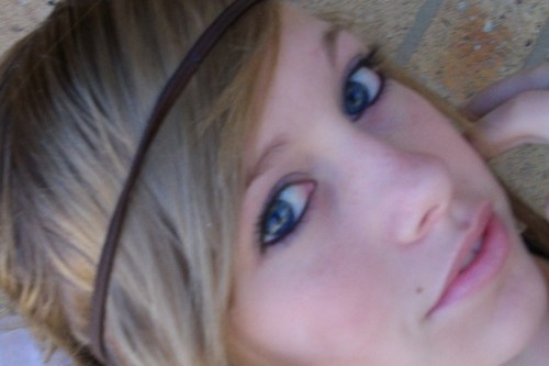 my name is Brooke...my favorite color is purple..i like all music..and i love to play sports!i love hanging out with my friends and love singing.:)