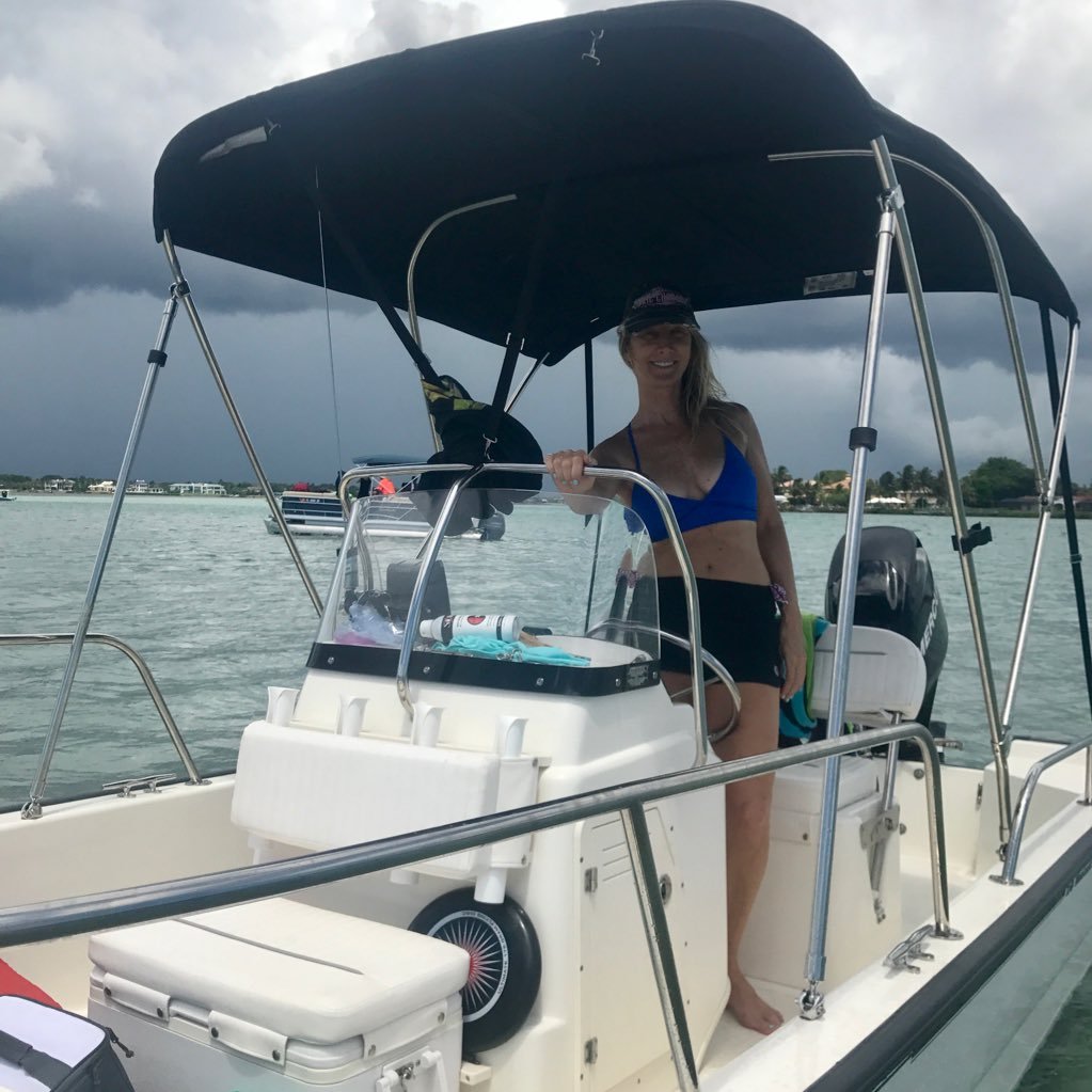 South Florida. Water. Dogs. Champagne. Flip flops. Country music. Enjoying boat life!