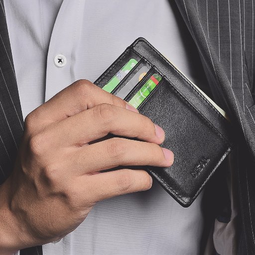 Elegant in its simplicity, this leather accessory has been expertly made from flawless black leather to keep your finances in stylish shape.