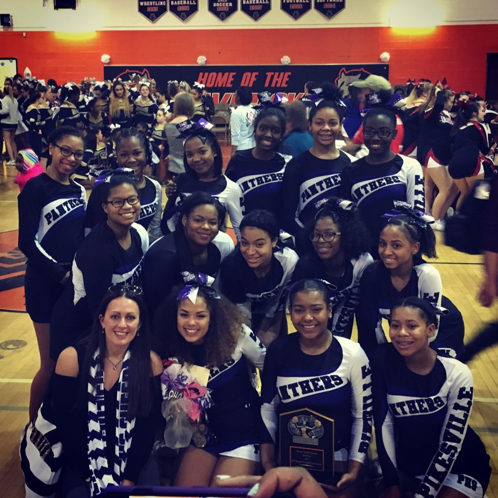The Lady Panther Cheerleaders of Pikesville High School 💜🖤