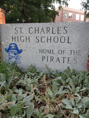 Father, Husband and Principal of St. Charles High School