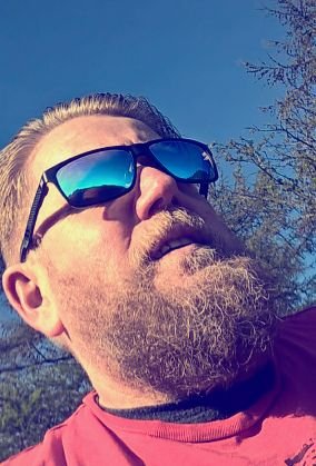 Philanthropist, bearded viking wannabe, happy and breathing