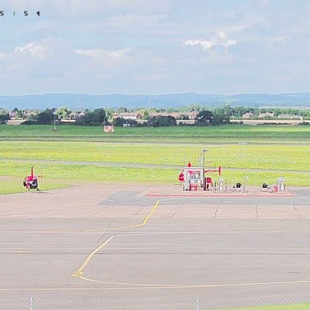 Gloucestershire Airport Webcam (Glos Staverton) live video cam showing main runway and windsock. Powered by the James Kenwrght Helicopter Flying School
