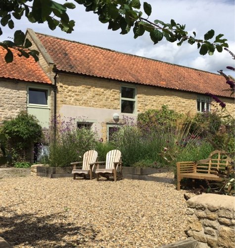 Ian and Jackie escaped to the North York Moors  & renovated the grade 2 listed Long Barn. Luxury self catering in 7 en-suite bedrooms for large groups of 14.