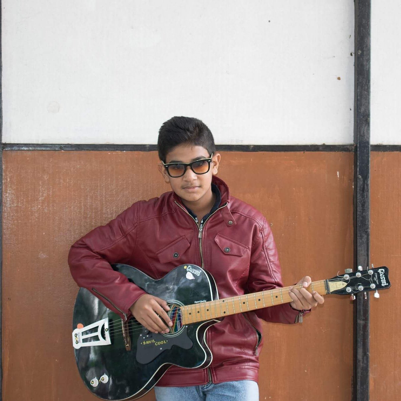 I am a guitarist a singer and a friend as well as a brother and a son....it means I am a complete men....I am cool I know....😎