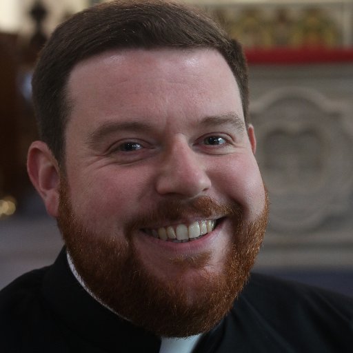 Parish Priest of St Teresa of the Child Jesus, Trent Vale and the owner of a cockapoo called Kolo