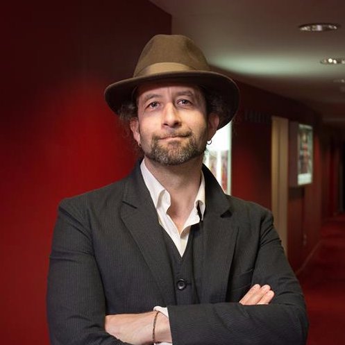 Director/Writer/Creative Director. Best British Short at LSFF 2018. Wearer of big hair and hats.