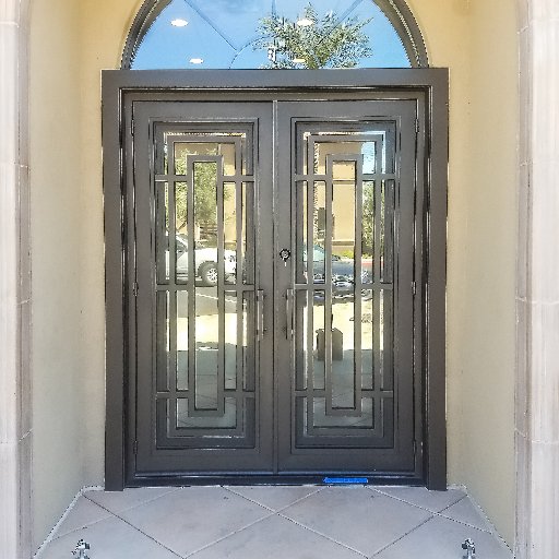 Manufacturer of custom iron entry doors, security doors, courtyard gates, privacy gates, and enclosures.