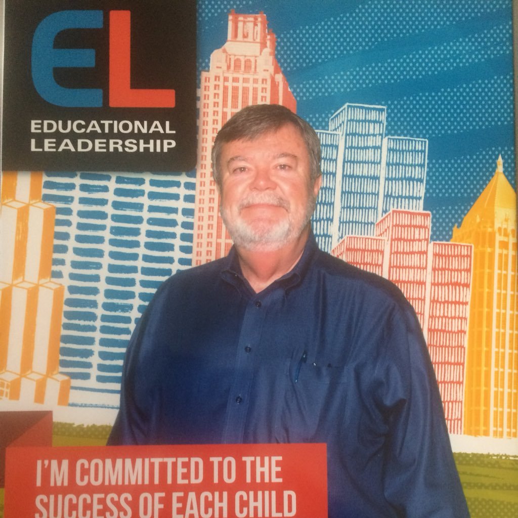 Educator, country music lover and occasional singer and banjo picker