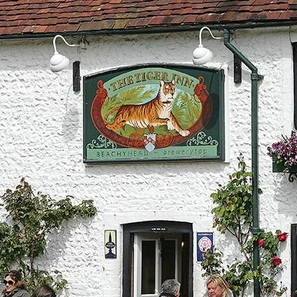 The Tiger Inn is a quintessentially English pub that offers award winning Real ales & lager, excellent food, luxury accommodation & a warm welcome.