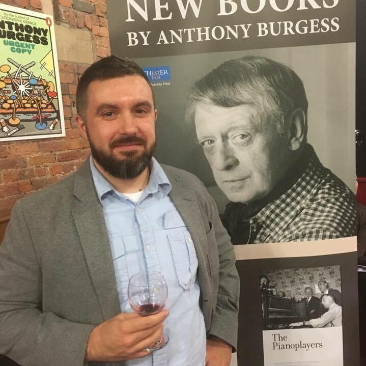 College English instructor; Ph.D. in English literature; Anthony Burgess scholar