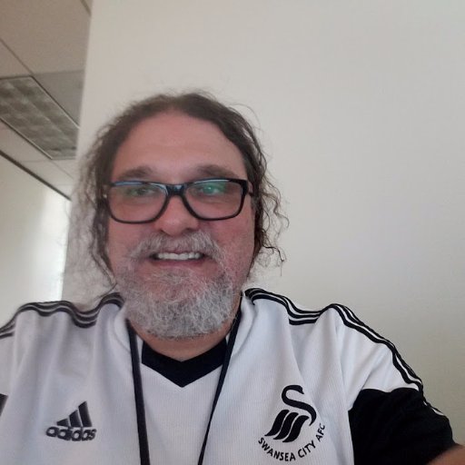 Cosmic Janitor, old coot in training, craft beer quaffing sportsaholic, eclectic musicologist, and lead pack member of the backyard doghouse bar & grill crew.