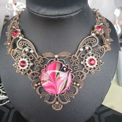 I design and hand paint and hand make one of a kind jewellery pieces and so much more.