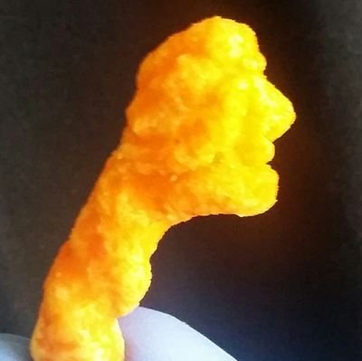 Found at the bottom of a Cheese Fix snack mix bag, CheetoTrump emerged from the orange dust to wage war on common sense and decency.