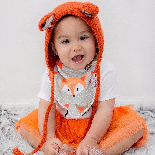 AdorologyBaby's profile picture. Enter our giveaway for a Baby Car Seat Cover in an adoroble feather design!!