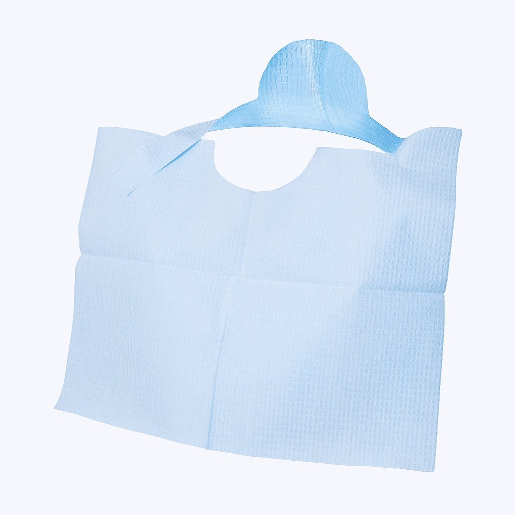 TapKin™, a patented disposable bib design with an integrated strap and adhesive tab. Recommended for the medical and dental industry.