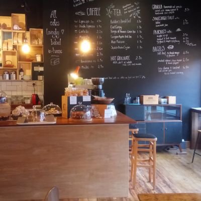 Coffee shop selling hand rolled bagels and cakes baked in house.