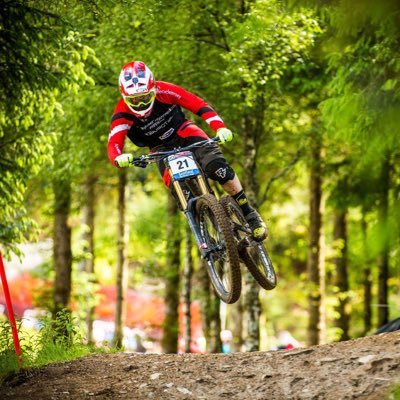 Downhill mountain bike racer, travel all over the world racing bikes!