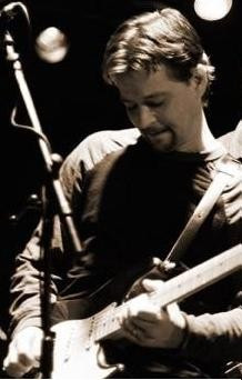 Rockin' guitar guy with Chicago band Hello Dave.