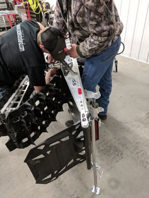 The SideKick snowmobile stand makes setup to repair your sled safe and convenient!