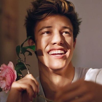 seeing him smile gets me to smile :) @camerondallas